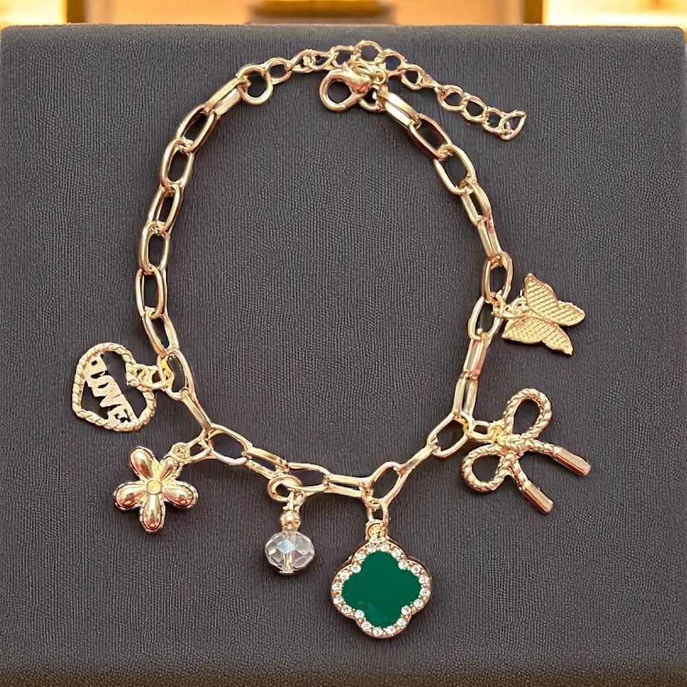 Gold Tone Charm Bracelet with Green Clover Heart Bow Butterfly And Flower Charm